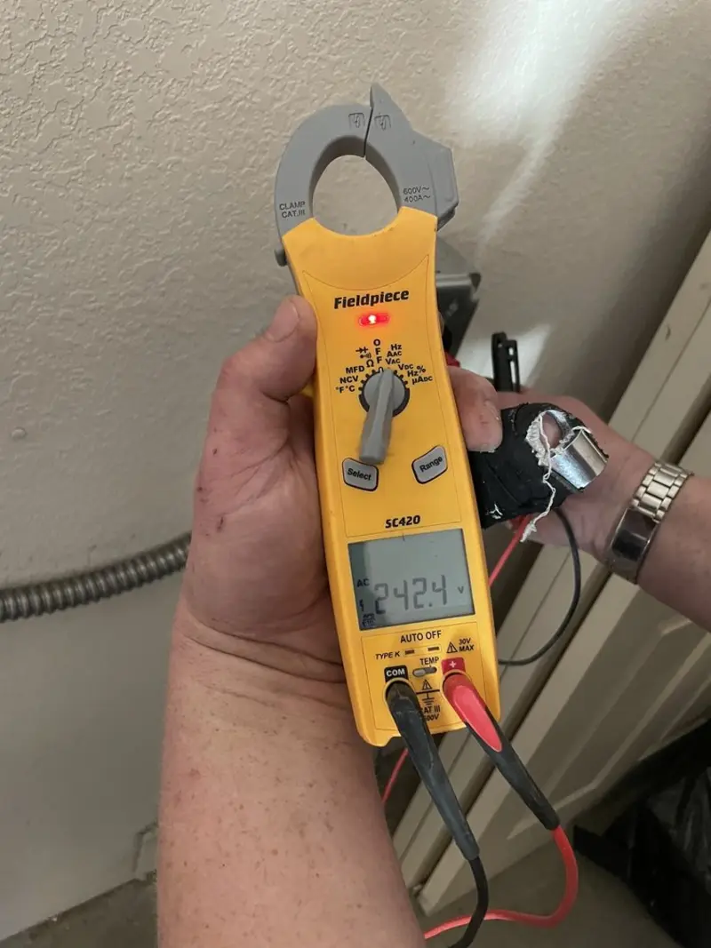 Voltage testing with clamp meter during Circuit Breaker Repair in Turpin Hills